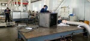 Worker performing welding with protective gear